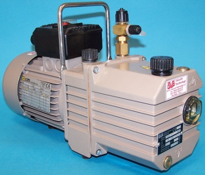 Refrigeration and Air Conditioning vacuum pump with refrigeration fitting attached.